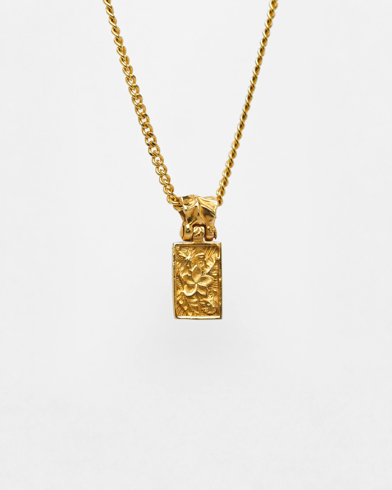 Nascence Pendant in 24ct gold plate — front view of the frangipani engraving on chain
